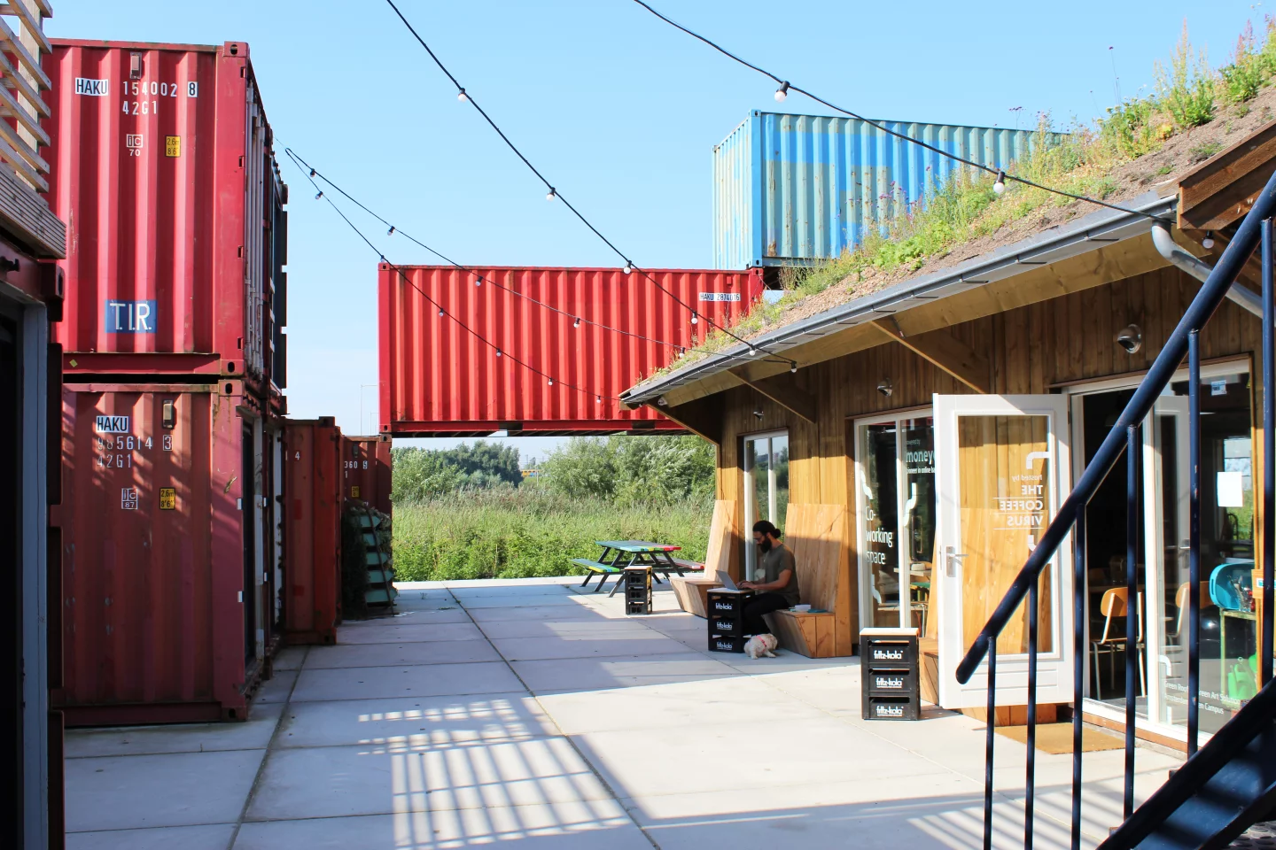 A set of upcycled shipping containers have breathed new life into a derelict and underused space at Amsterdam Science Park