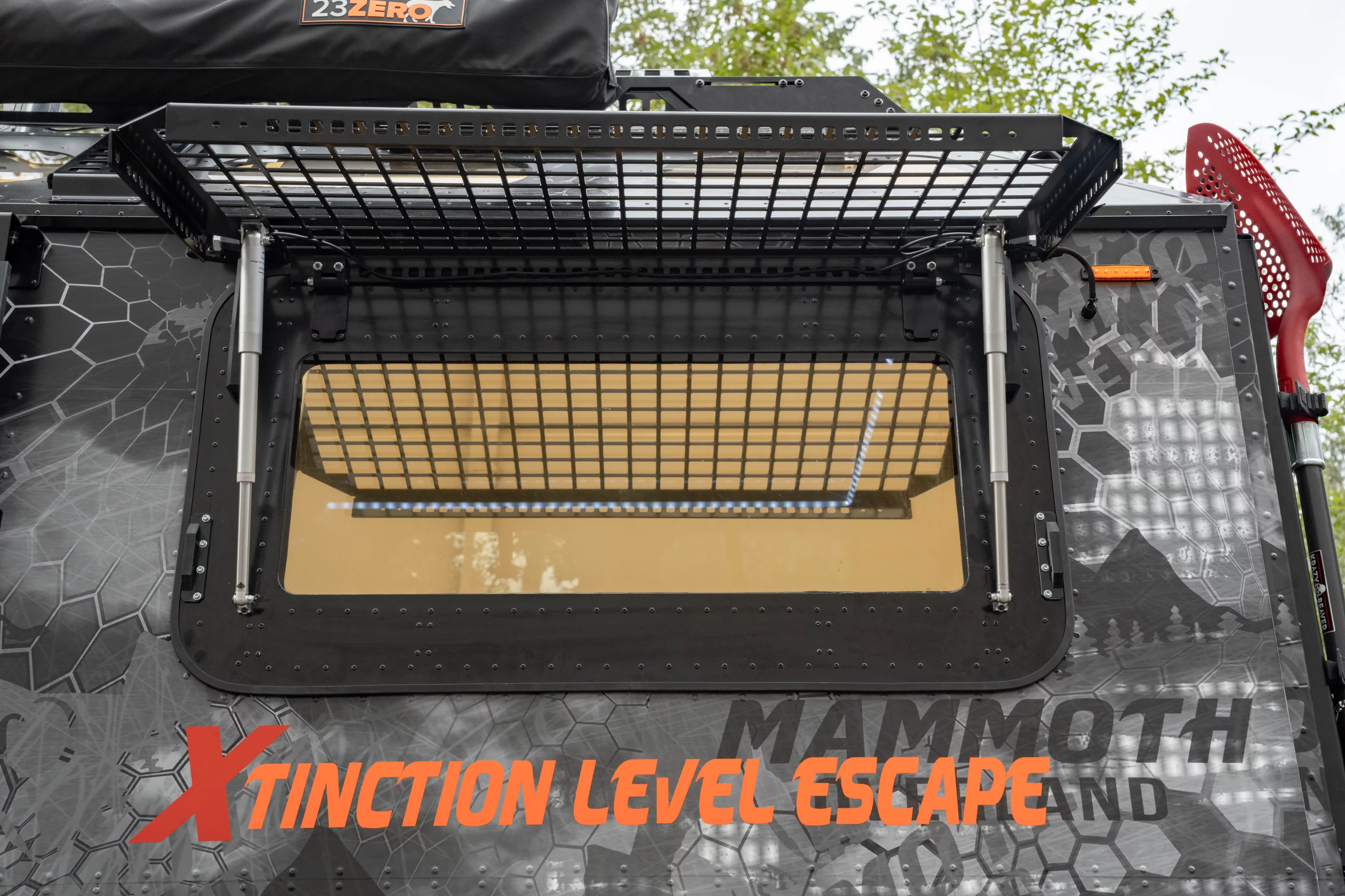 The windows are made from 1-in-thick bulletproof glass, further protected by MOLLE style blast shields
