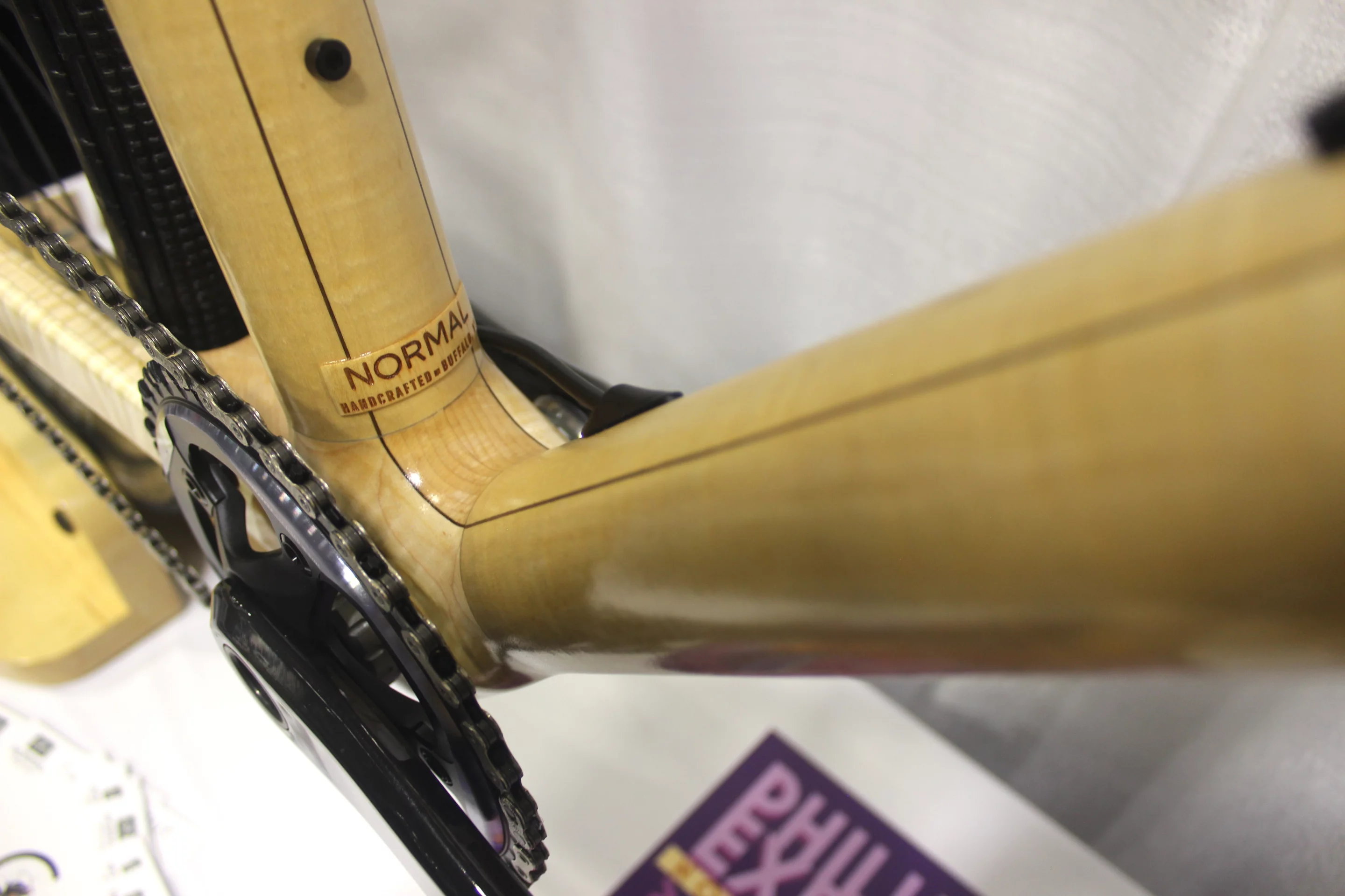 The wooden tubes are joined to one another using an aerospace grade aluminum alloy and titanium fasteners