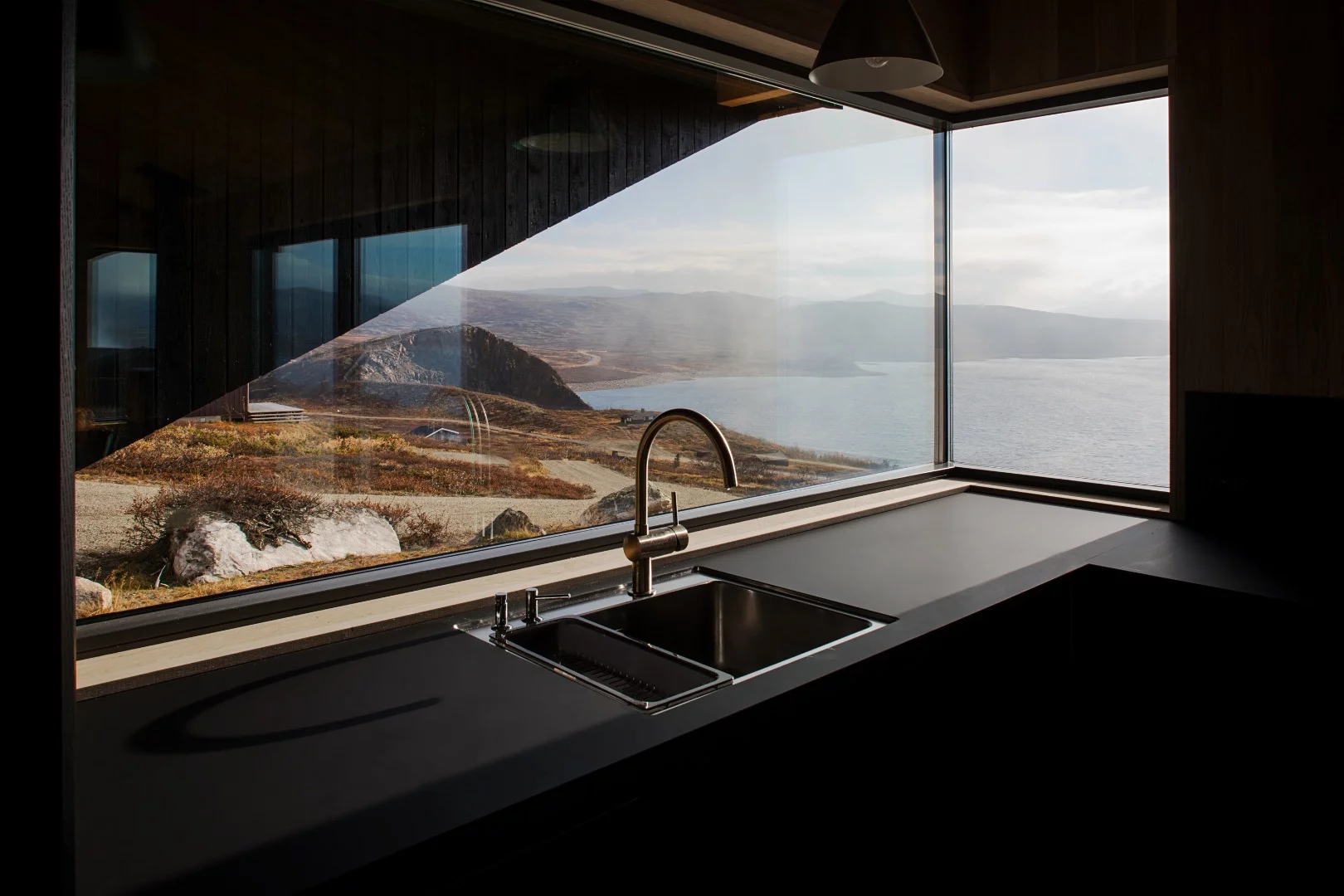 The Hooded Cabin's kitchen looks out over the rugged landscape