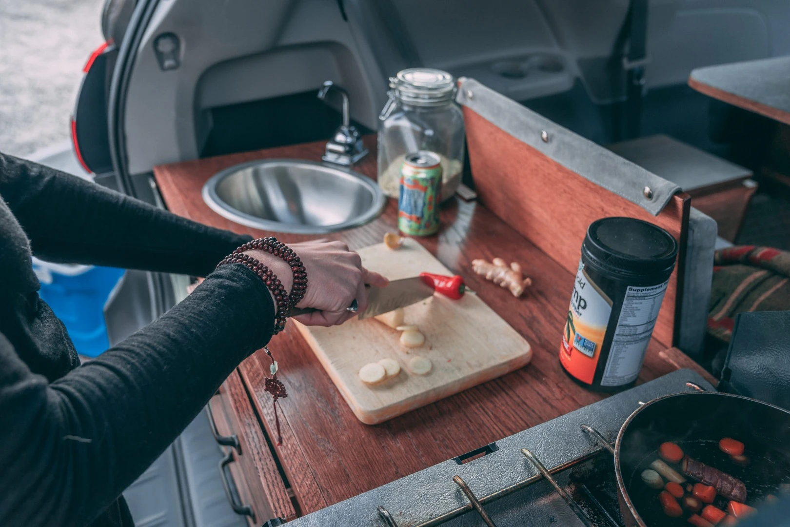 Preparing dinner with the Oasis camper van