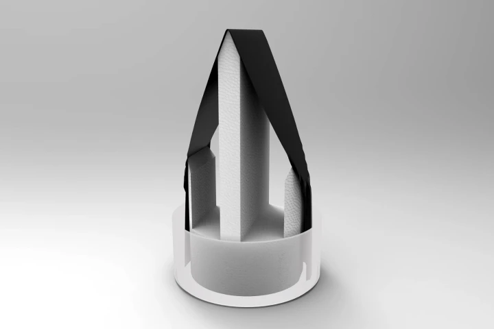 The new water purification technique involves draping a sheet of carbon-dipped paper in an upside-down “V"