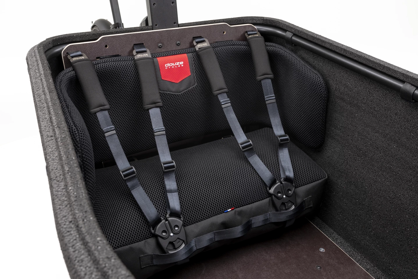 The cargo box can be optioned with seating for up to three kids or one adult