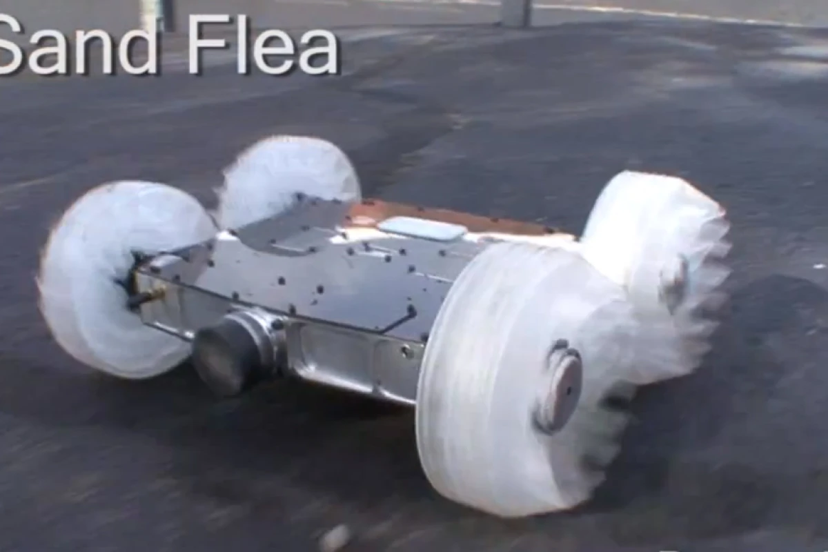 The Sand Flea robot can leap to heights of 30 ft (9 m) thanks to a CO2-powered piston visible on the rear