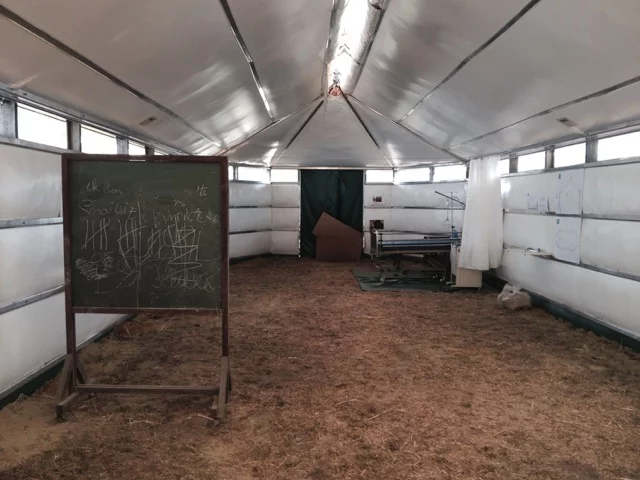 The shelter's construction materials include galvanized steel and aluminum supports, while the walls and roof would be built from layers of hard wearing tarpaulin