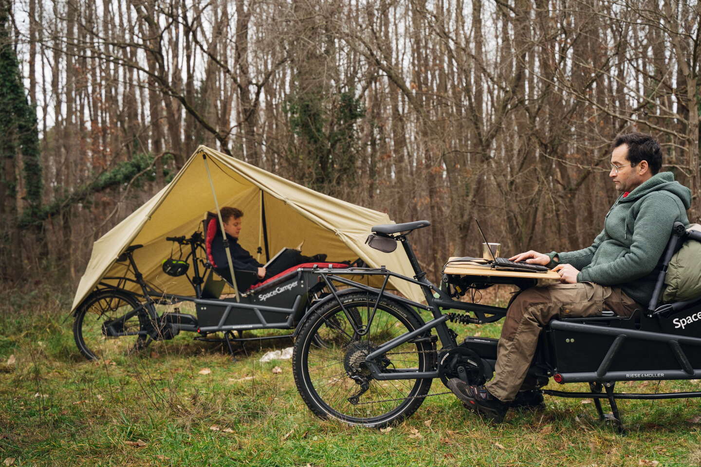 Spacecamper tent-top ebike micro RV pitched at cycling digital nomads