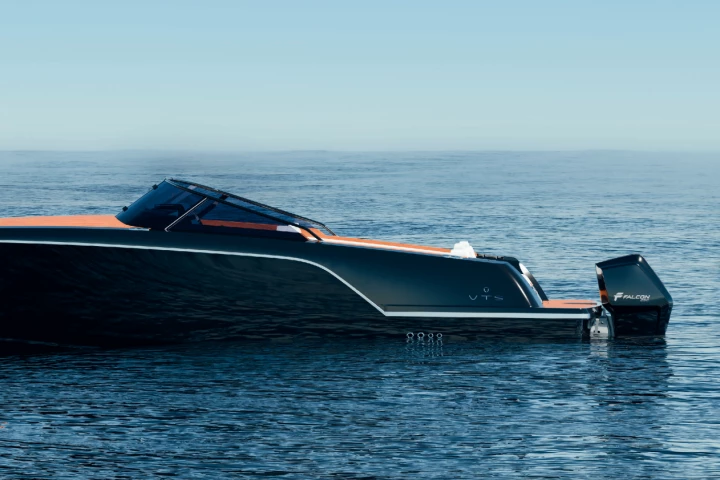 An EPT Falcon 130 outboard mounted to a sleek, fast tender ready to sprint