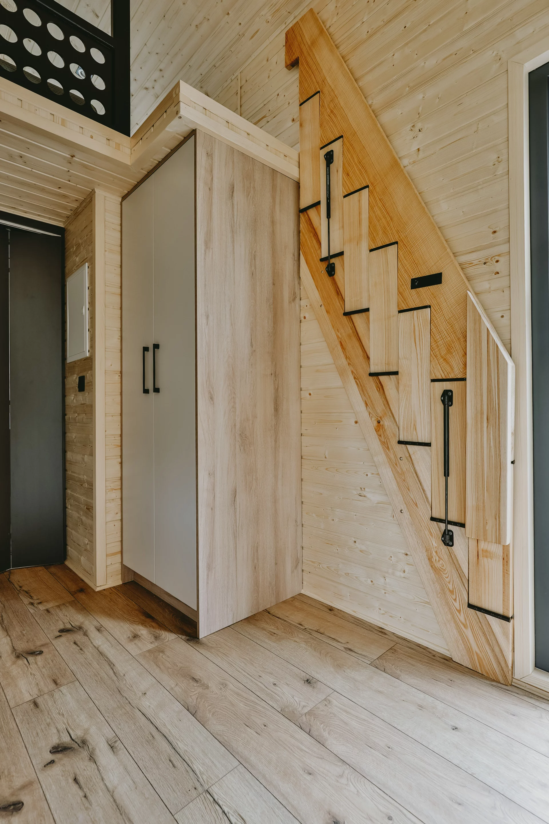 The Alan's folding staircase helps maximize available floorspace downstairs