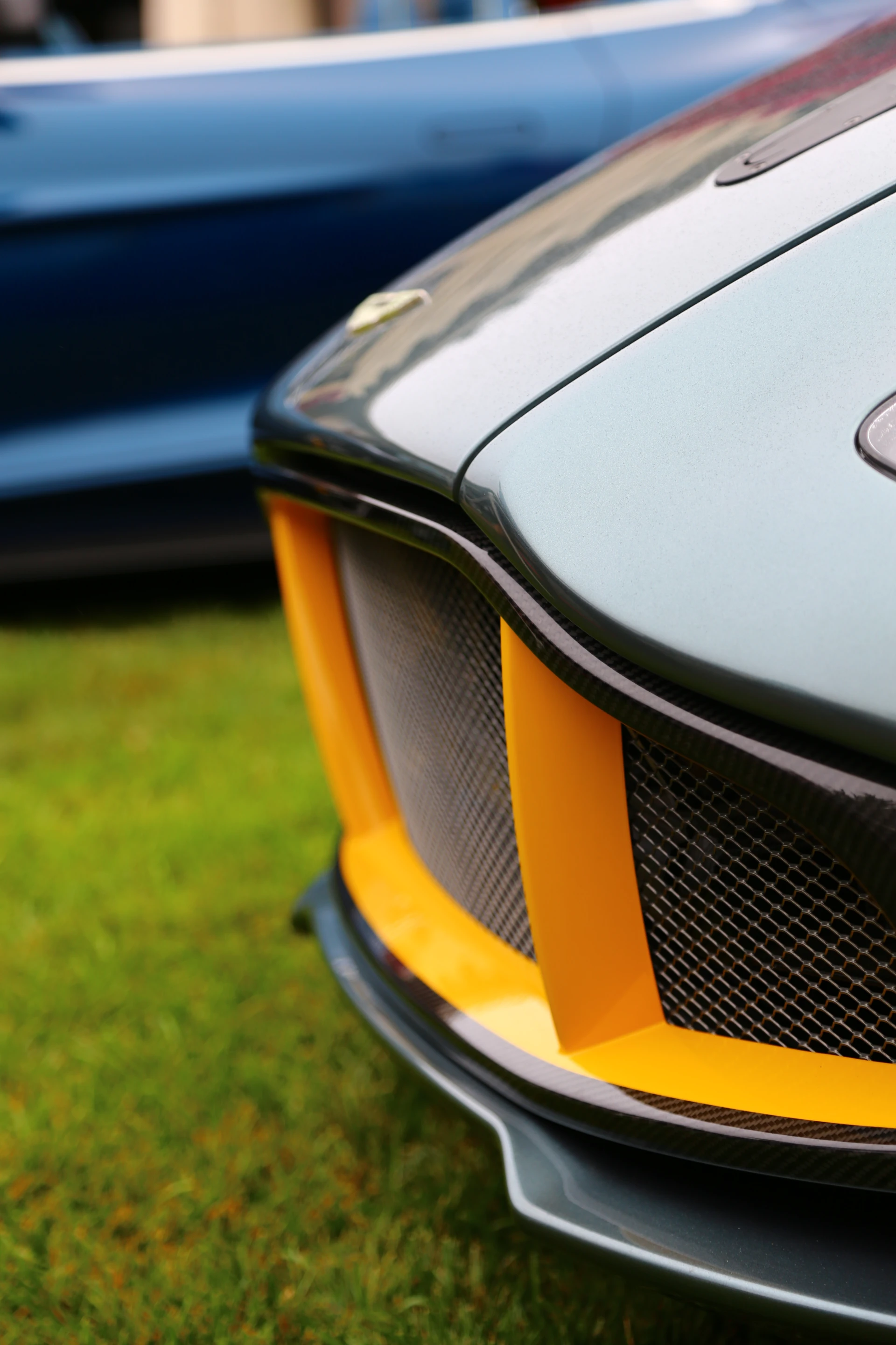 Aston Martin's signature race colors and 100 year anniversary decals populate the carbon fibered body (Photo: Angus MacKenzie/Gizmag.com)