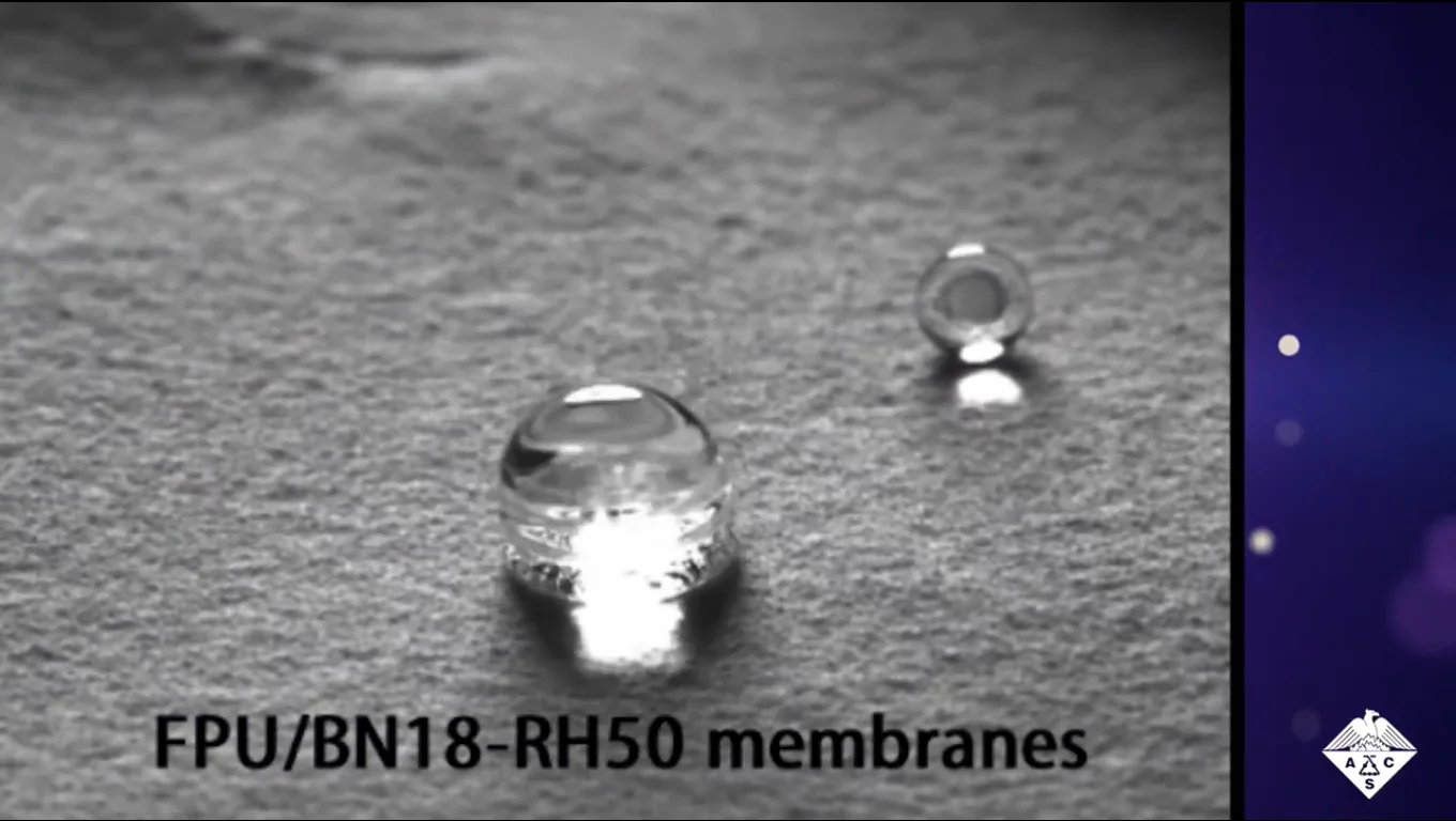 The new cooling material remained waterproof on the outside, as demonstrated here with water droplets bouncing off its surface