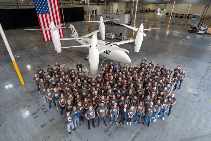 The Overair team poses with the fully functional Butterfly eVTOL prototype