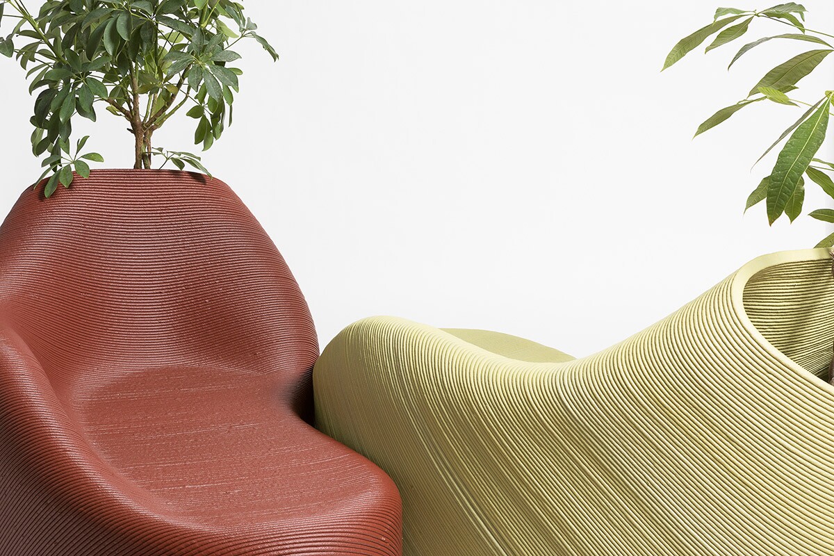 The 3D-printed street furniture sits somewhere between ergonomic bench and plant pot