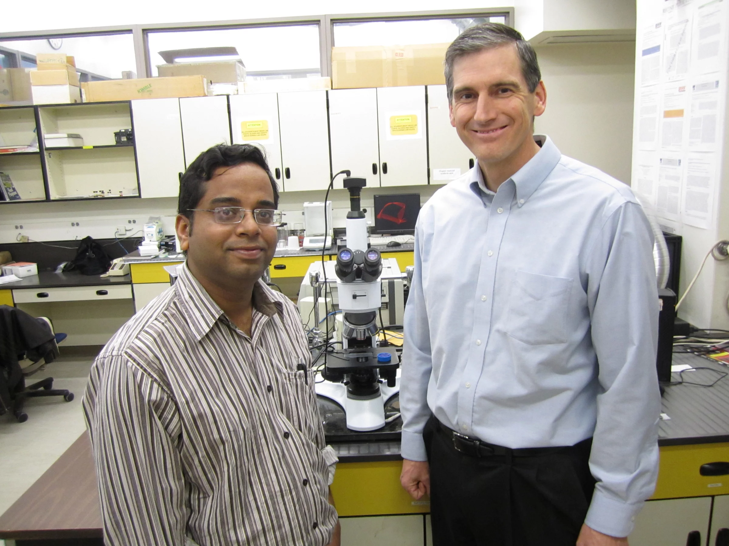 Prashant Sarswat and Michael Free, two metallurgical engineers at the University of Utah, devised a cheaper, faster method using a microwave that had previously been in a kitchen used by students (Photo Credit: Lee J. Siegel, University of Utah)