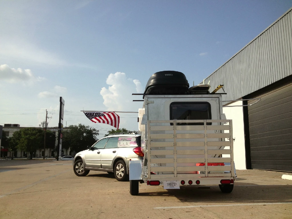 In addition to working as a truck camper, the Firefly mounts to trailers as small as 5x8 feet