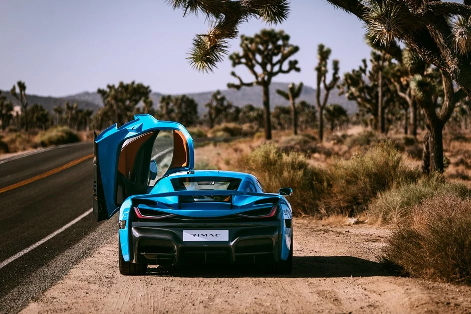 When gullwing doors aren't quite enough, you have to rethink and go with butterfly wing doors instead