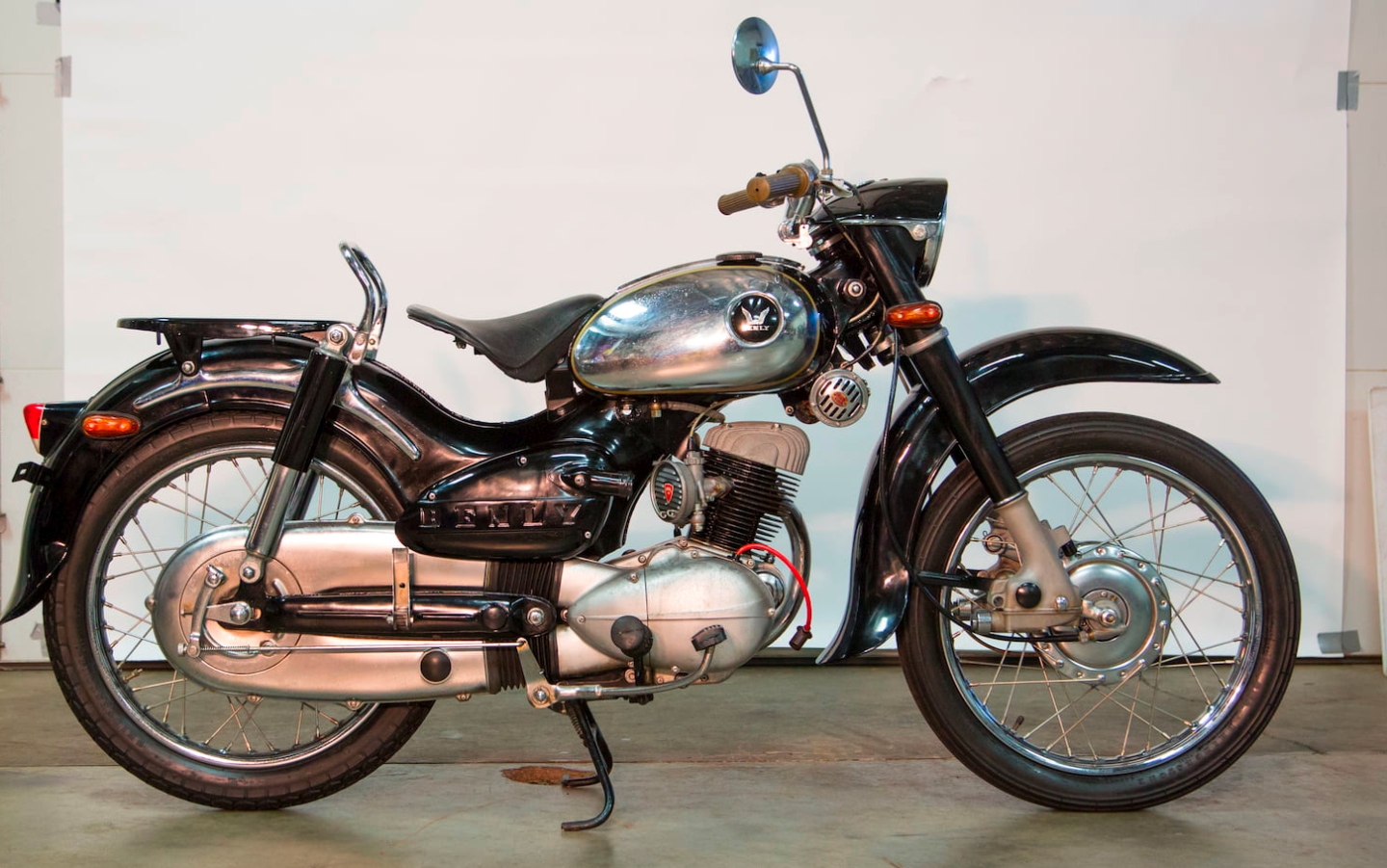 This Japanese market 1958 Honda Benly 125 was produced before America even had a Honda dealer, though Honda had already been producing complete motorcycles for a decade prior to this. When it was built, Honda was preparing to compete at the 1959 Isle of Man TT races for the first time with a racing version of the Honda 125 cc Benly, and Kihachiro Kawashima would leave not leave Japan to establish Honda's first overseas base, American Honda Motor Co, until June 10, 1959. It sold for $7,975