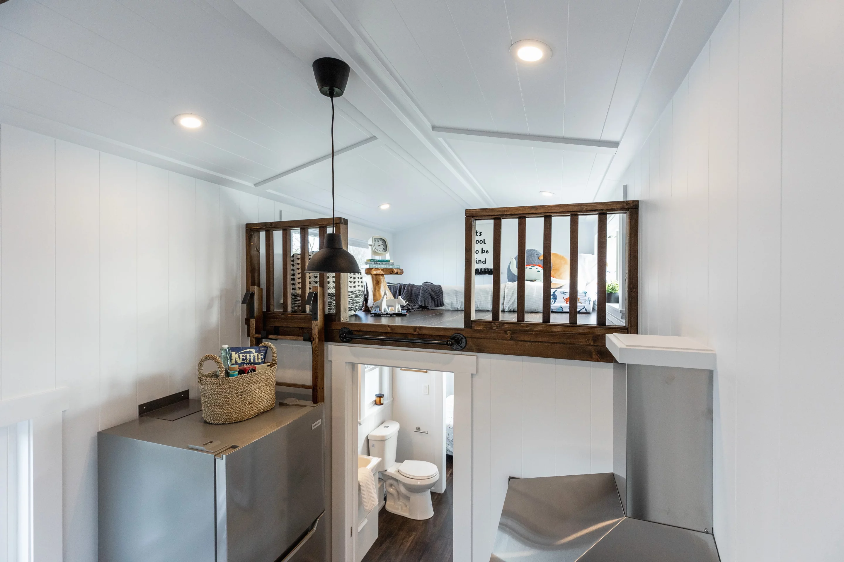 One of the Violet Edition – Scarlett Loft's loft bedrooms is accessed by ladder