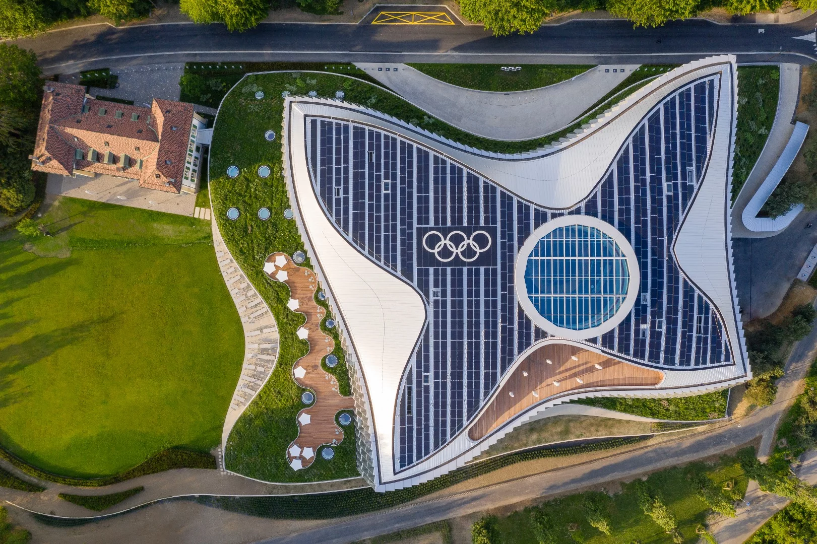 The Olympic House is topped by a solar panel array