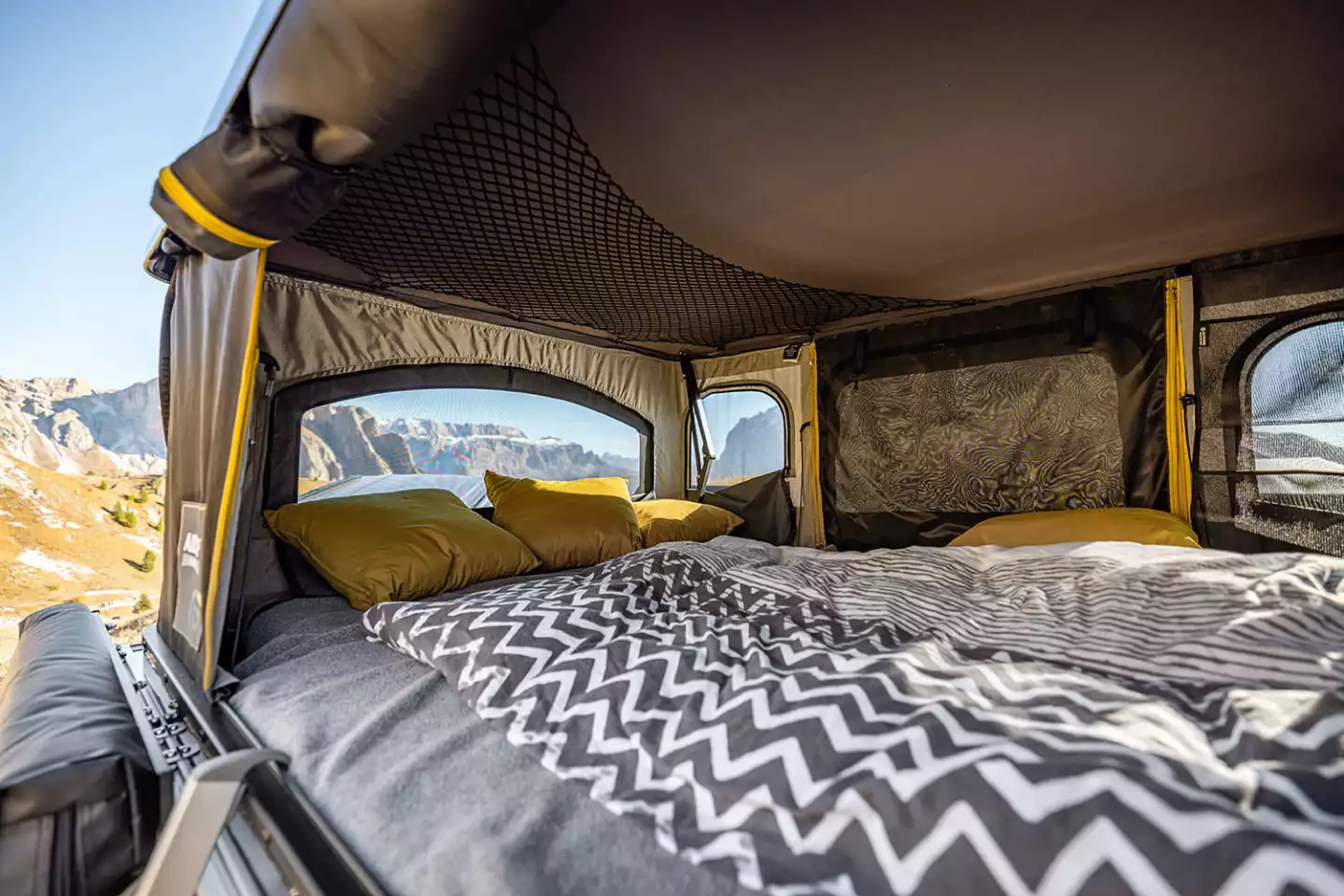 Optional Airhome rooftop tents provide breezy upstairs living