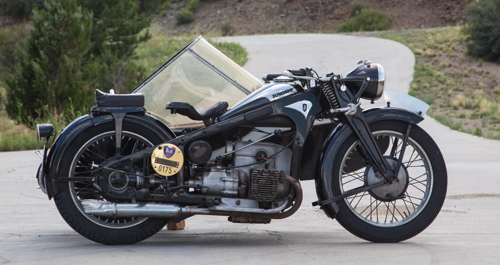 The Zundapp K500 is an extraordinary motorcycle with a sweet 500cc horizontally twin-cylinder side-valve engine, an unusual all-chain 4-speed gearbox and the most exquisite art deco styling and this example with sidecar sold for $29,700 at Mecum last Friday. The pick of the Zundapp range was the four-cylinder K800, one of which sold on Saturday for $58,300.