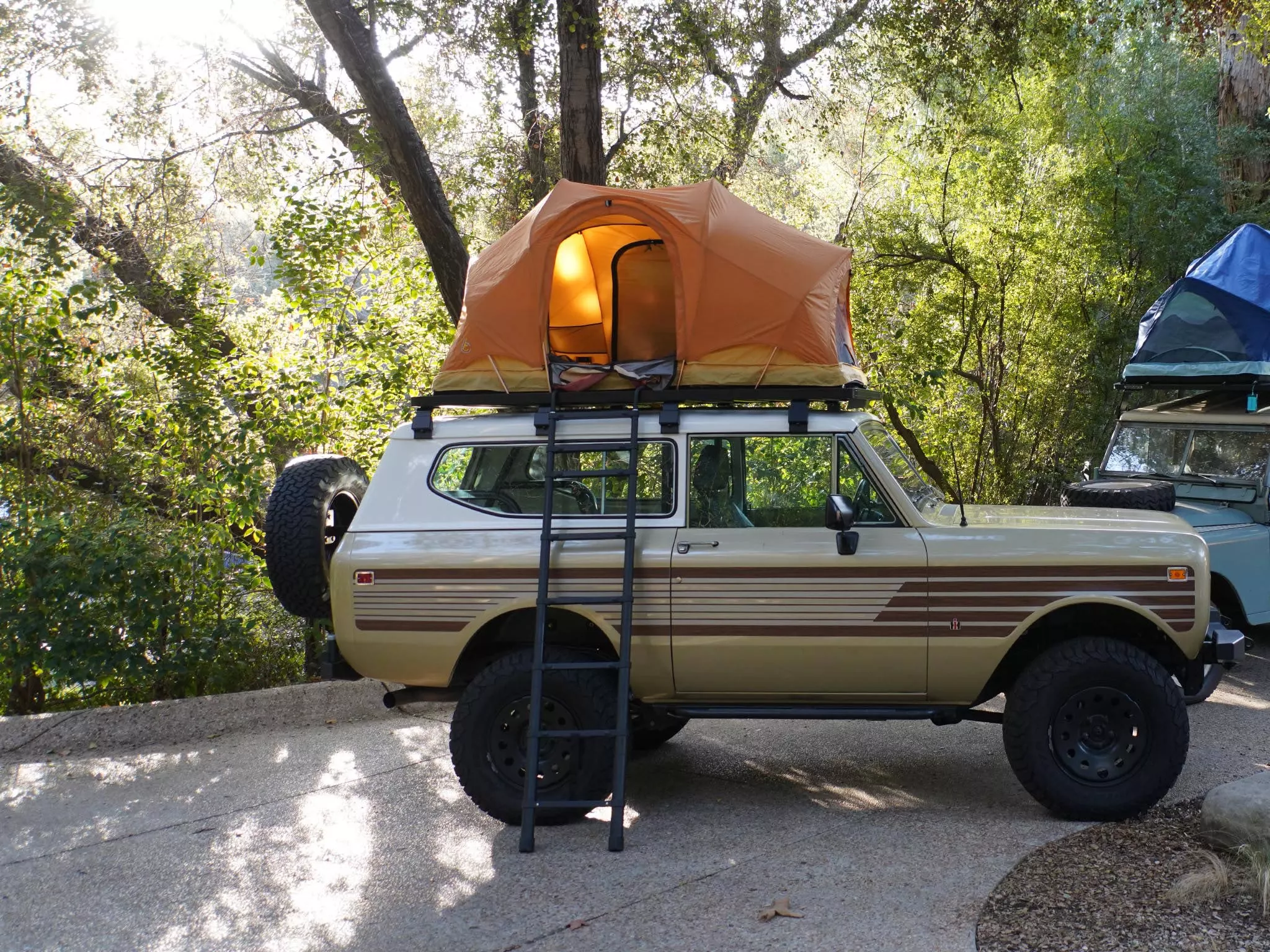 The Rev set up as a rooftop tent; in addition to its own platform with ladder, C6 offers just the ladder for $129
