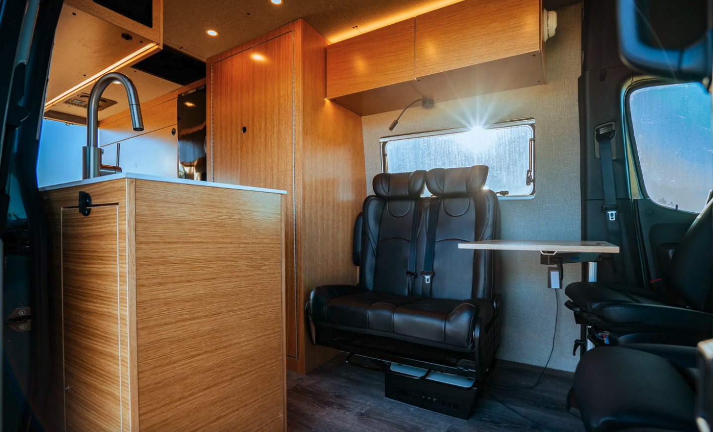 The versatile front lounge includes a swivel rear bench and fully adjustable Lagun table
