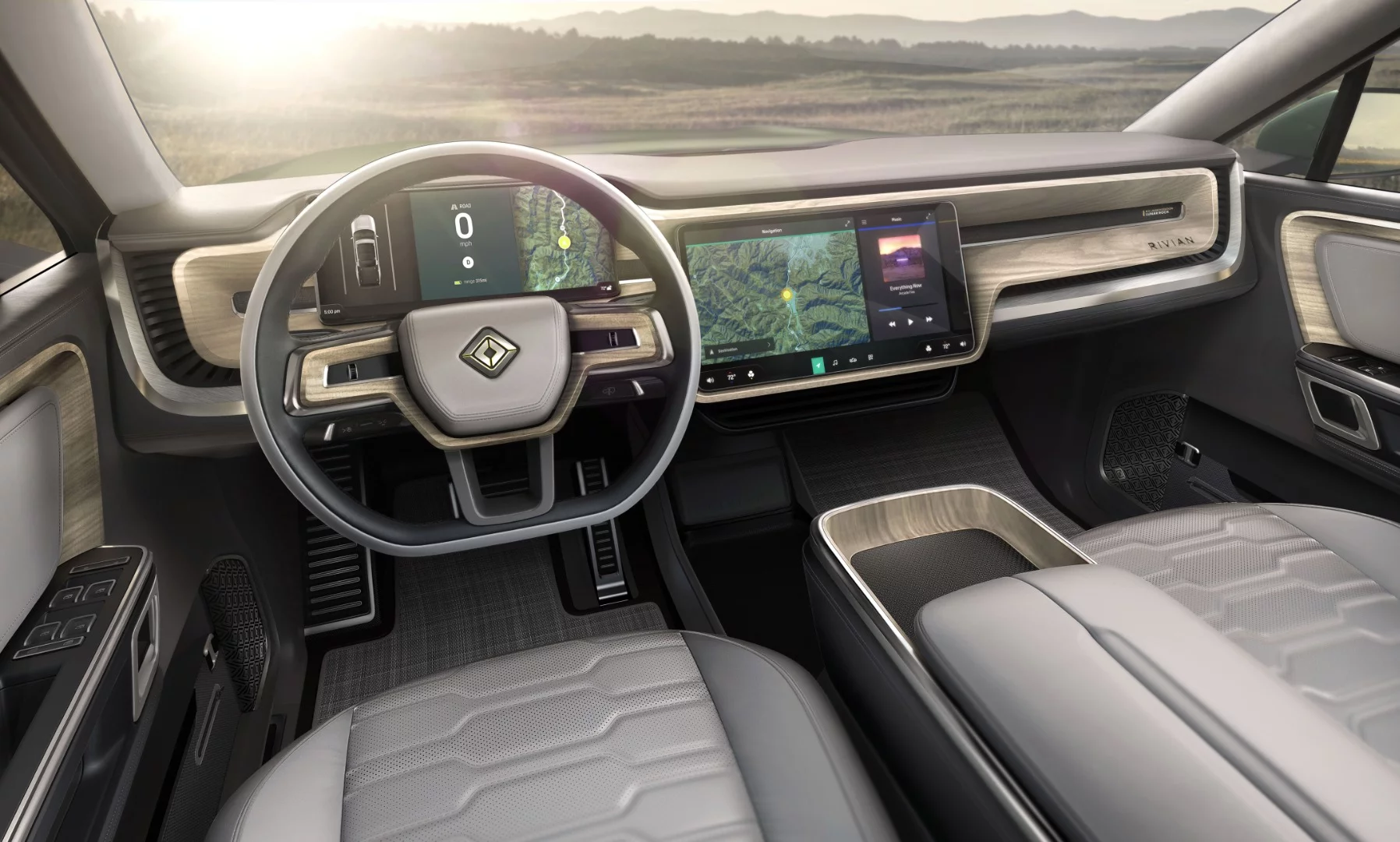 On the inside, the Rivian SUV is all business with a sleek, near-minimalist design that centers on two large output screens and wood inlay