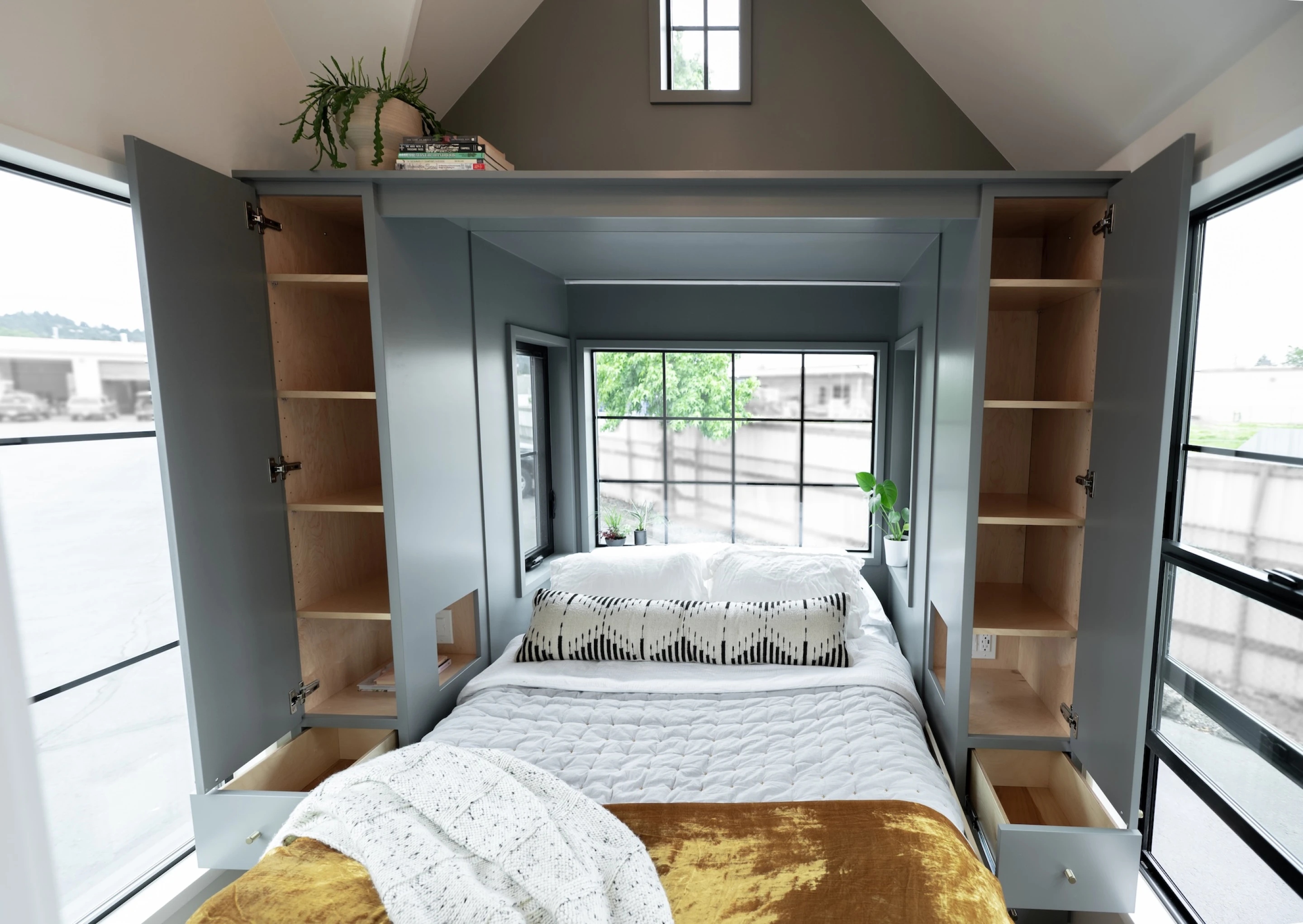 High-end tiny house doubles down on storage and space-saving design