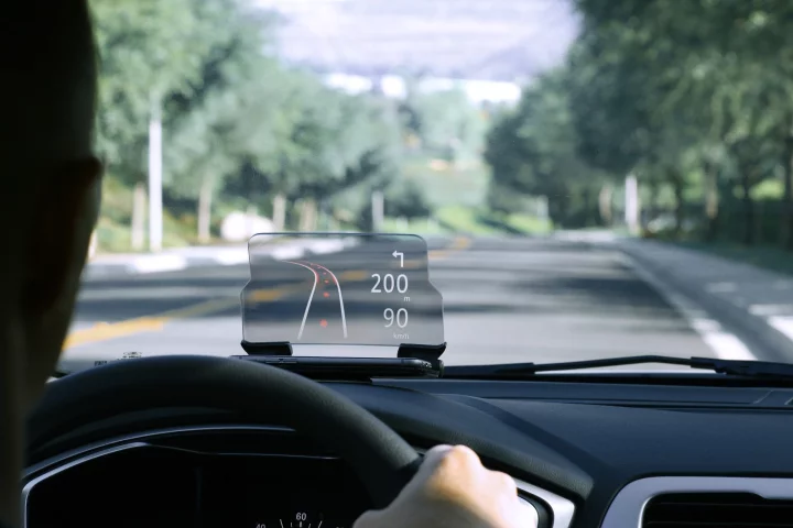 The Hudway Glass is a smartphone cradle that sits on top of your car's dashboard and reflects images from a phone's display onto a curved plastic screen