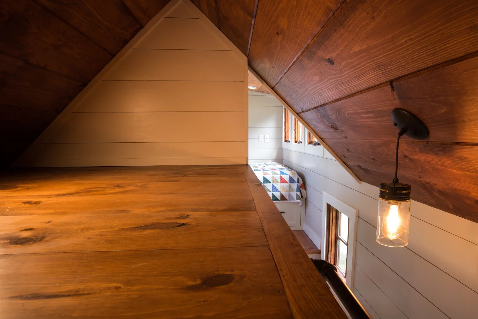 The Denali's small storage loft is accessed by pipe ladder