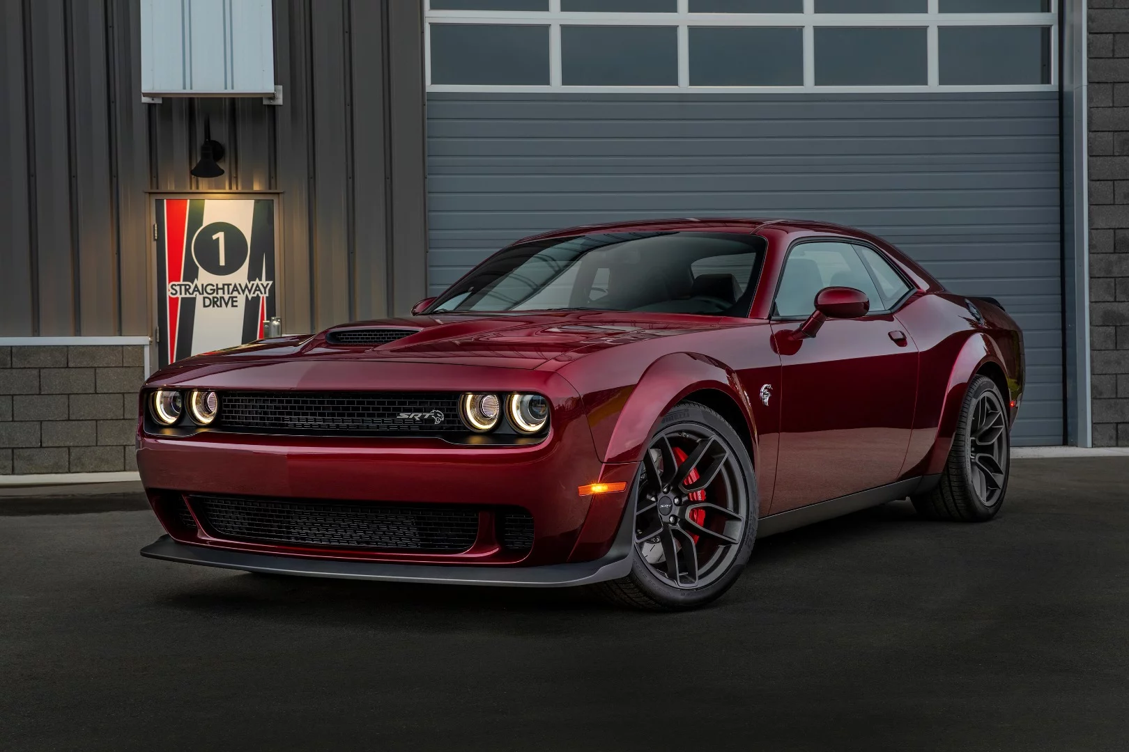 The Challenger SRT Hellcat Widebody rides on wider new aluminum wheels