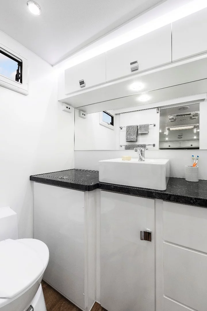 The Tremor has a full dry bathroom with a sink, ceramic toilet, shower and even a washing machine