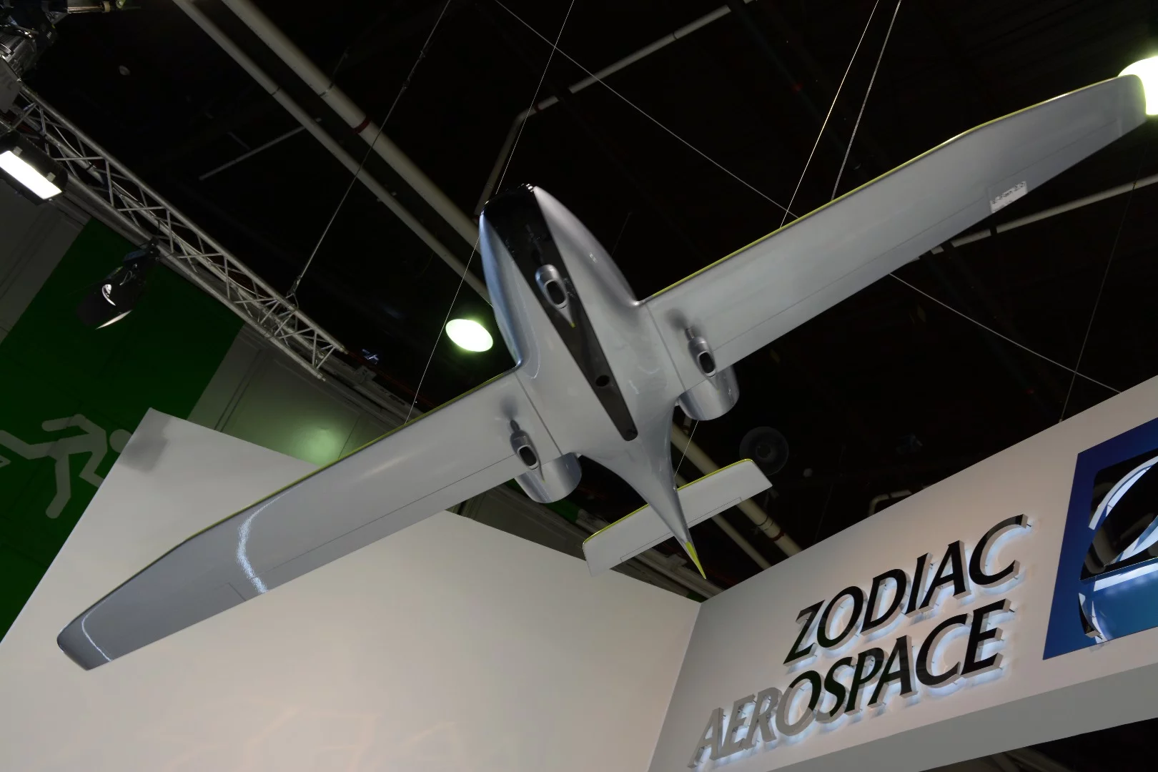 A model of the upcoming E-Fan 2.0 hangs above the Zodiac Aerospace booth at the Paris Air Show