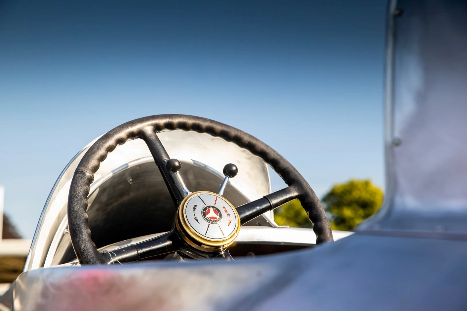 Sitting low and back, the SSKL driver stays under the slipstream of the car as it races. Or so the designers figured