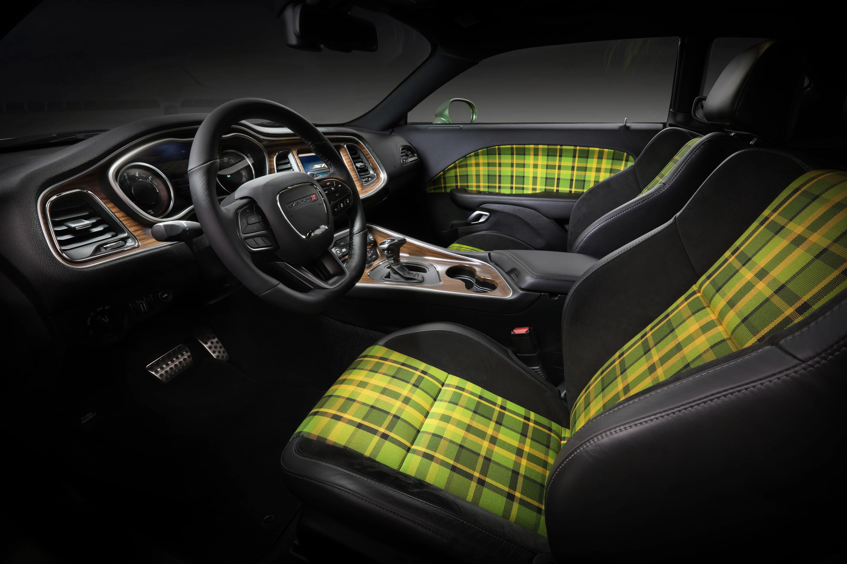 The Dodge Challenger Holy Guacamole concept's green and yellow plaid door panel inserts and seat upholstery pay tribute to the original 1970 Challenger