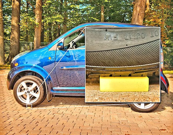 A Smart car parked on top of a thick piece of NASA's new polymer aerogel (Photo: NASA)