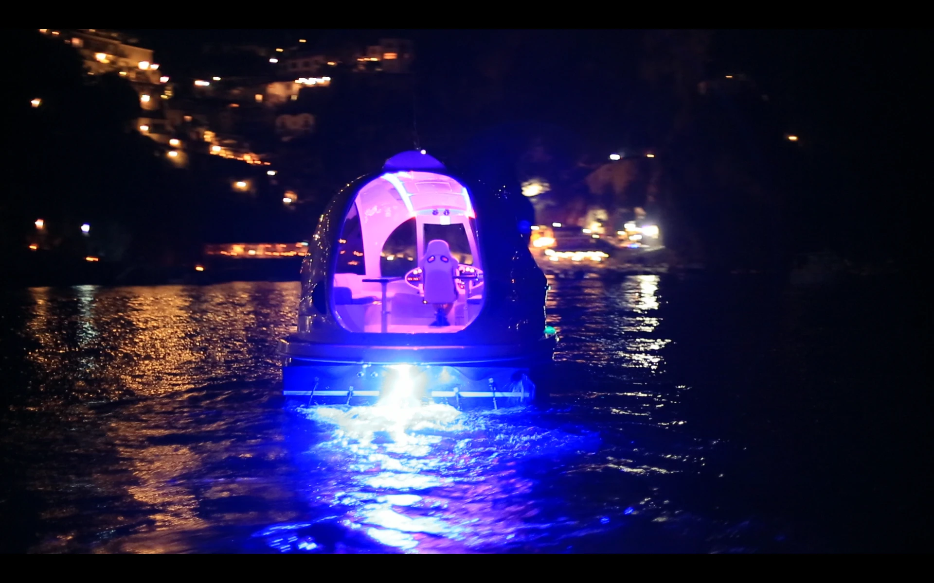 Jet Capsule floats by night