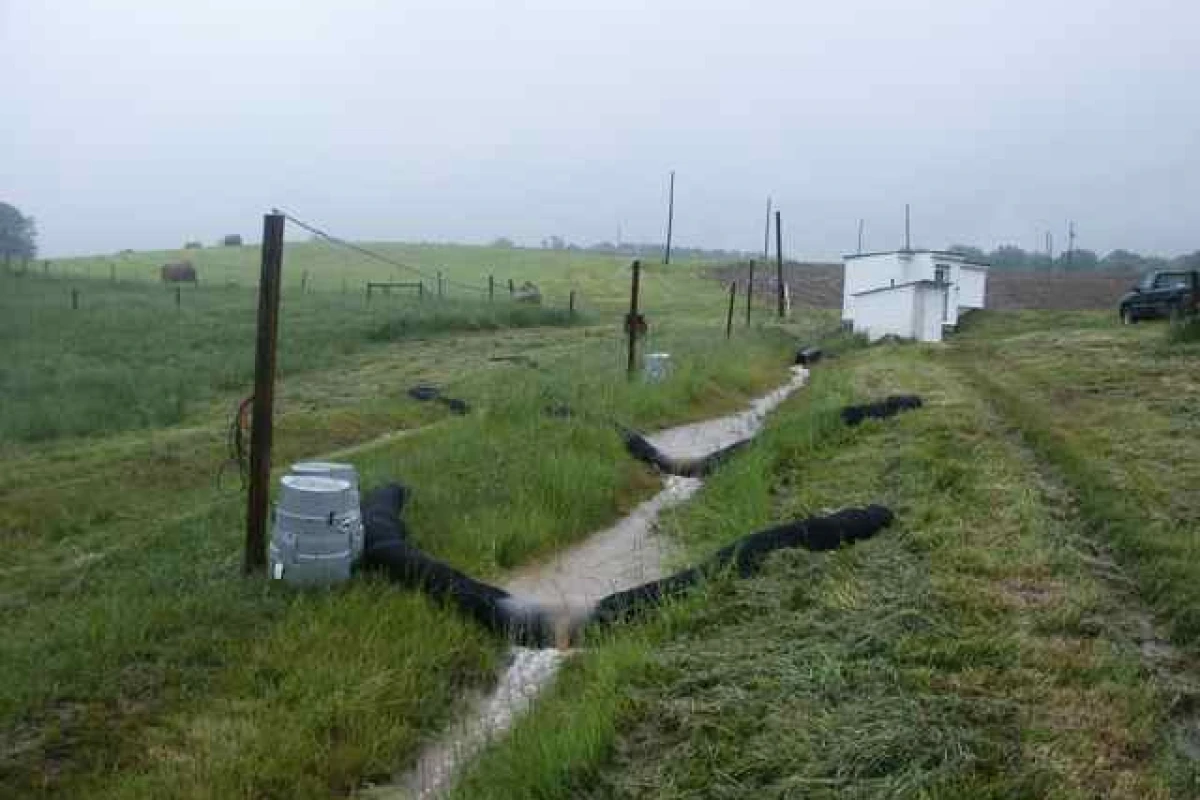 The compost filter socks in place, in a grassed waterway
