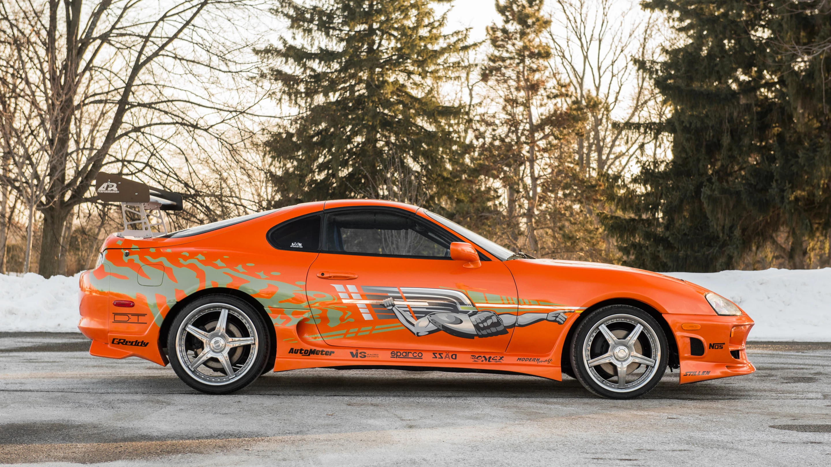 This car just might be one that surprises as the recently deceased Paul Walker is the posthumous star of Furious 7, a movie that has just been released and is smashing box office records willy nilly. The car is the iconic orange Toyota Supra driven by Walker in The Fast and The Furious (2001), is expected to fetch $150,000 to $200,000 but ... anything could happen on the day.
