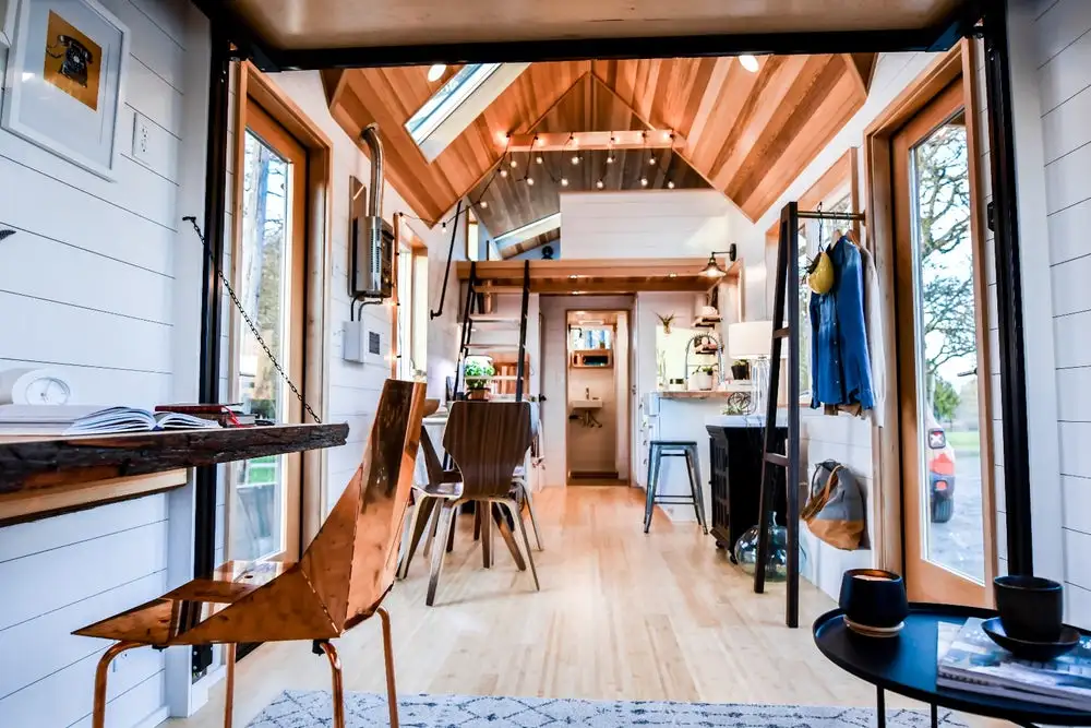 Elsewhere in the Urban Payette with Elevator Bed is a kitchen, bathroom, and a sleeping loft accessed by storage-integrated staircase