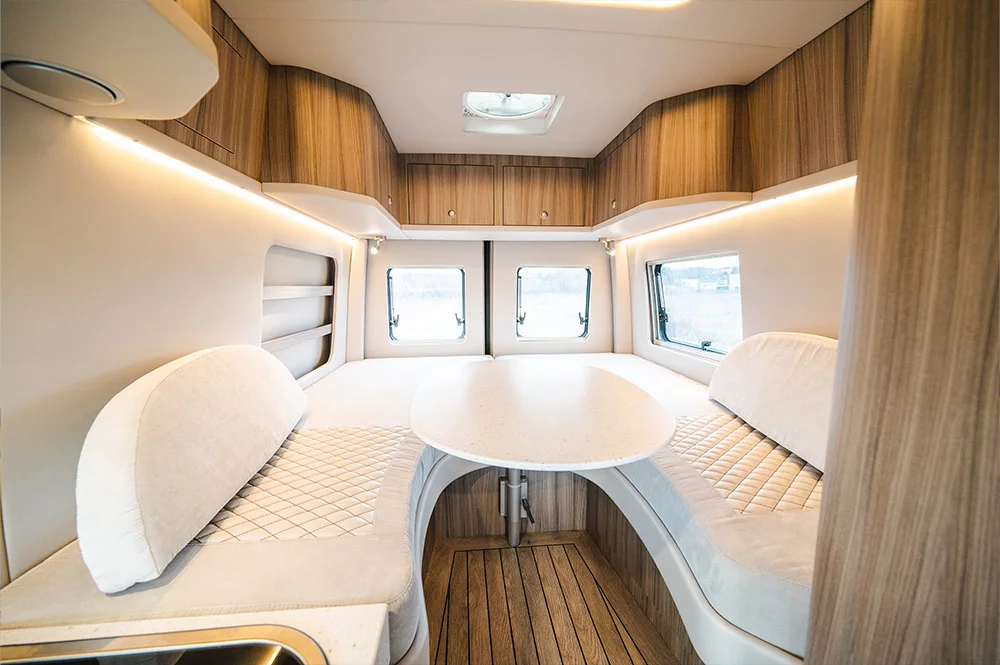 Innova uses a curvy rear dining lounge layout