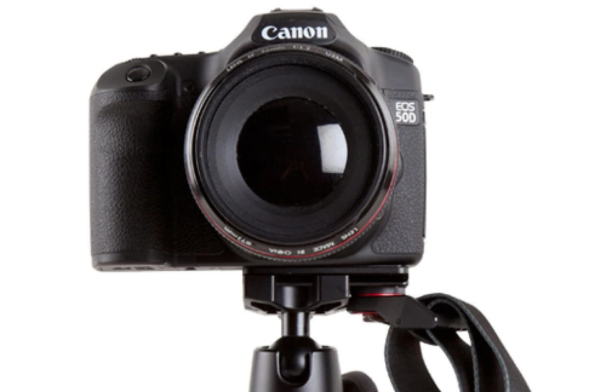 The Joby UltraPlate can be used with a both a tripod plate and a shoulder strap at the same time
