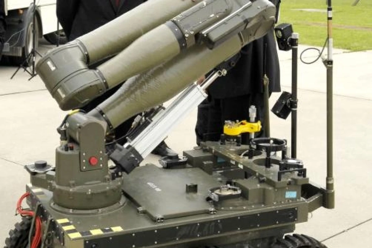 Under-Secretary of State for Defence, Derek Twigg MP, paid a visit to East Anglia to highlight the defense industry's support for the community. At Wattisham Airfield, he met Northrop Grumman's Nasser Bhatti who displayed the prototype CUTLASS robotic veh