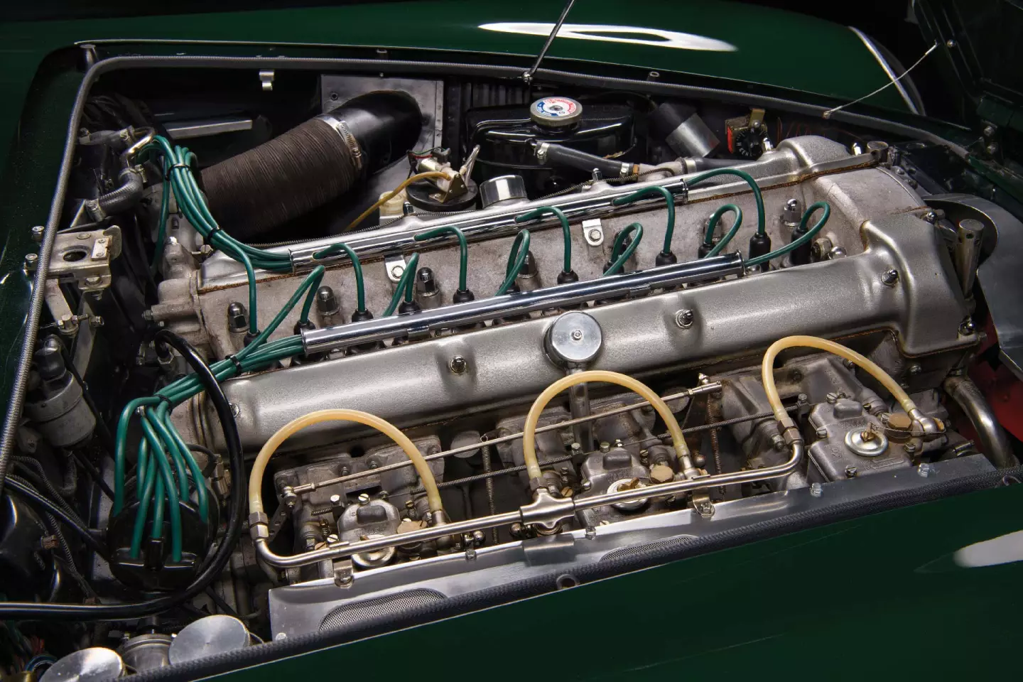 The 4.0-litre engine in this car was factory fitted in March 1963, with the official service records for the car noting that ‘repairs carried out following fire.’ Aston Martin’s engine shop records note that the engine was part of a sequence built for the Lagonda Rapide. The remainder of the engine, with the exception of the block, remains original as it left the factory in 1961.