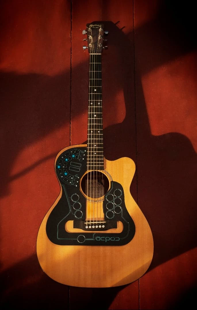 The Acpad surrounds an acoustic guitar's soundhole