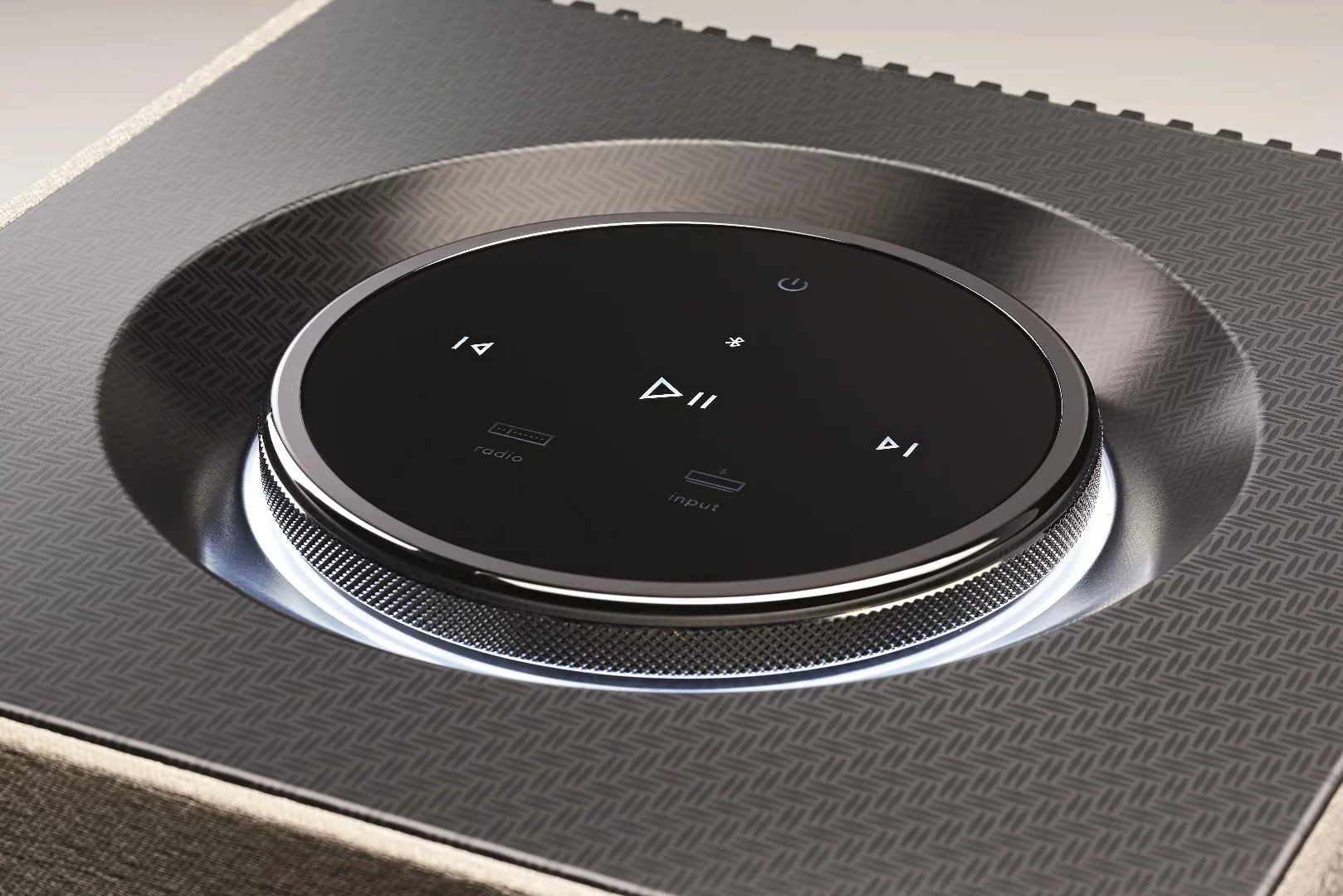 The new speakers include a patterned housing and knurled dial inspired by Bentley