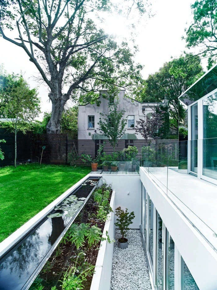The Covert House boasts sustainable features that include rainwater collection and solar panels