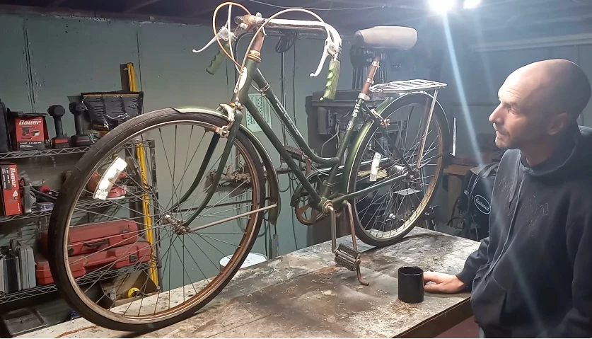 Christopher Terpstra sizes up the original $10 donor bike
