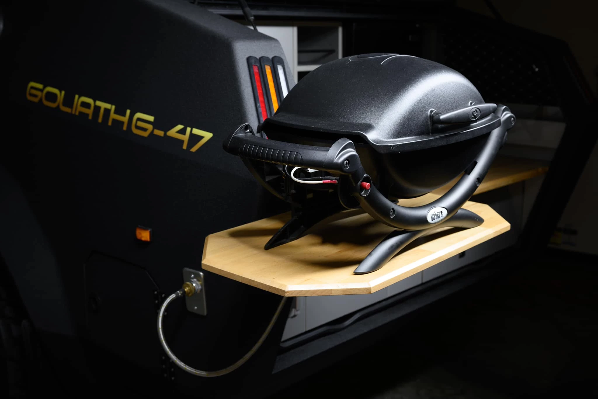 Not only does Goliath offer a Weber grill, but it's plug-and-play thanks to the gas tank hookup integrated on the trailer corner