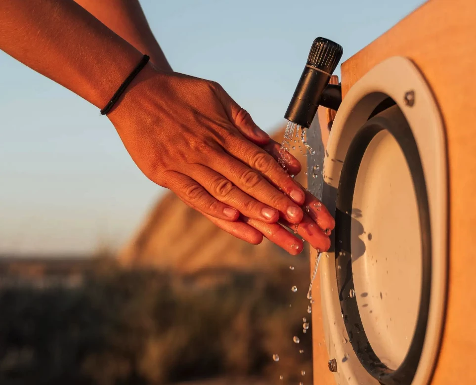 The Campboks includes a water system with pump and two 12-L water canisters